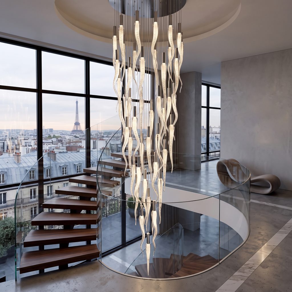Multi-drop curved pendants in a double-height stairwell